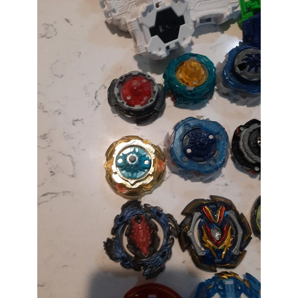Lot Of 8 Beyblade And Different Parts